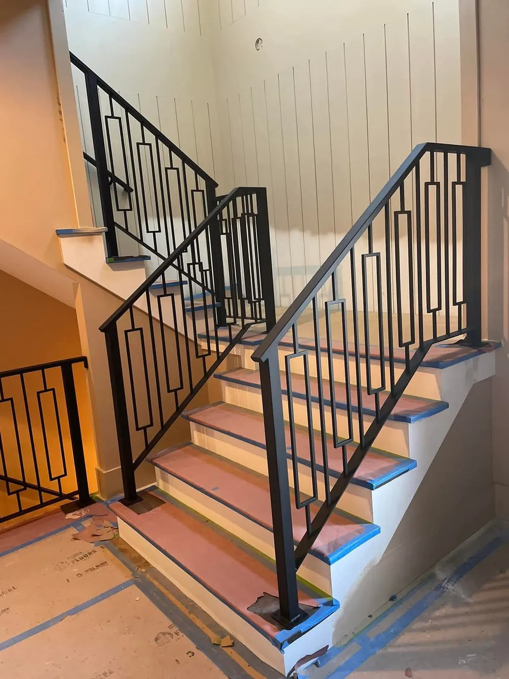 Custom geometric-pattern interior stair railing