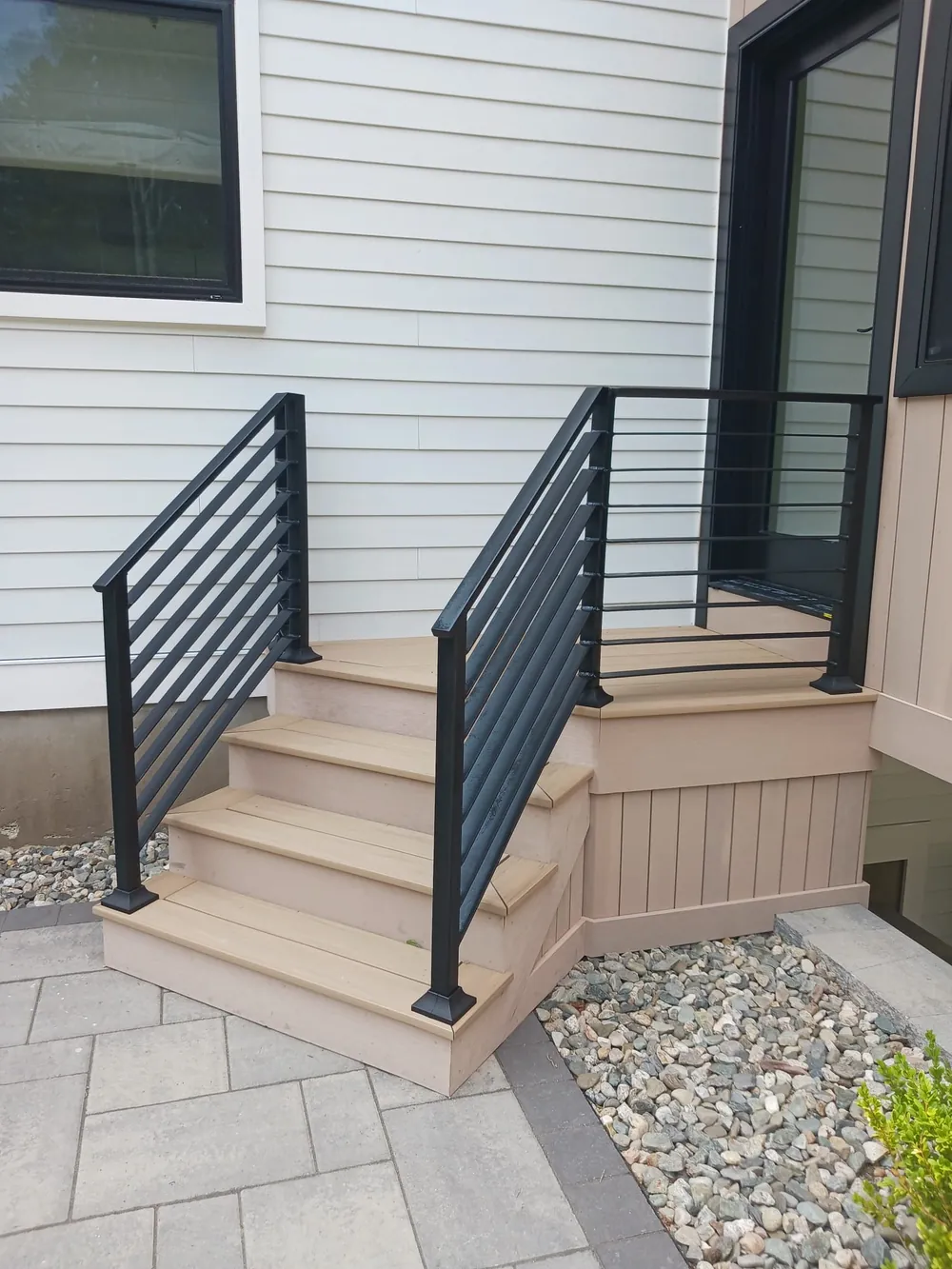 Horizontal-bar railings on a modern entry