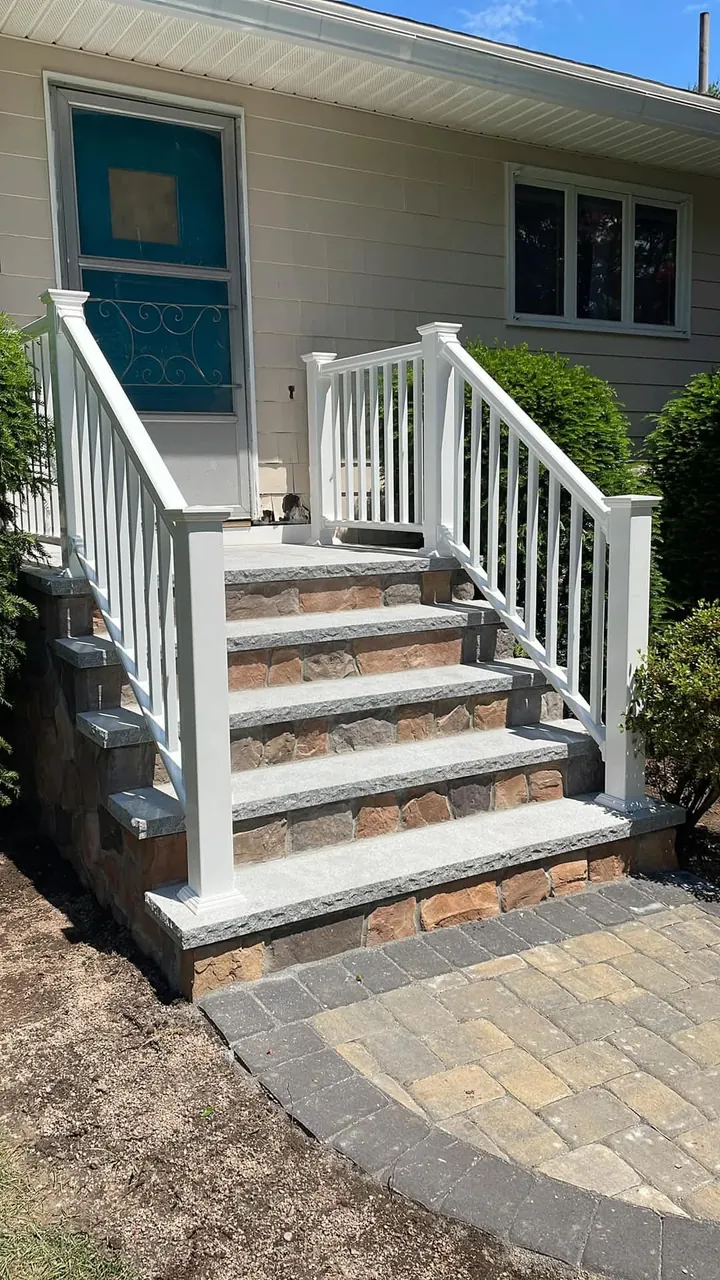 White vinyl railings on front entry steps